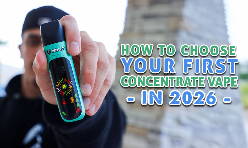 man showing off the Wulf Budr Concentrate Vaporizer outside building with text
